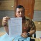 Kadis DLHK Kabupaten Tangerang menunjukan surat yang sudah dilayangkan ke KLHK.
